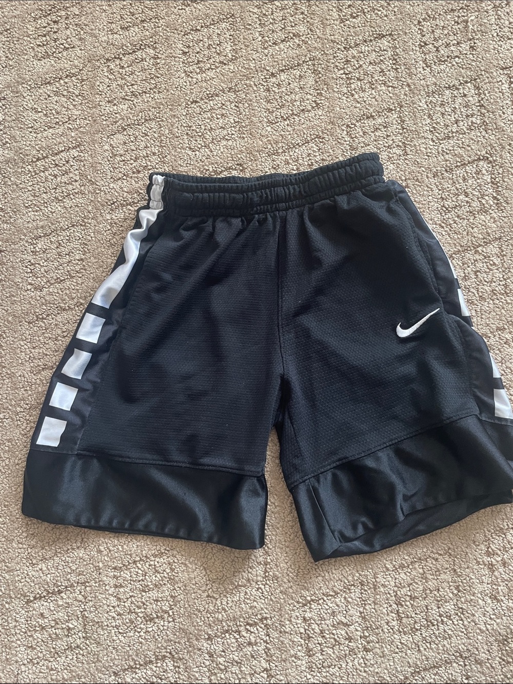 Nike Black Athletic Shorts with White Swoosh and Side Accents